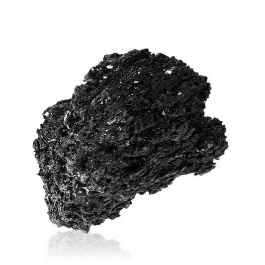 Carborundite or Silicon Carbide mineral, black shimmering surface, known for protection, mental clarity, and spiritual strength.
