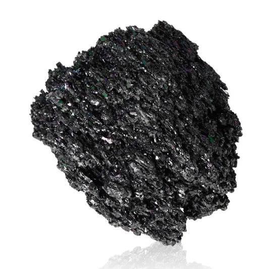 Close-up of Carborundite showcasing its textured, metallic sheen and iridescent shades of blue, purple, green, and silver.
