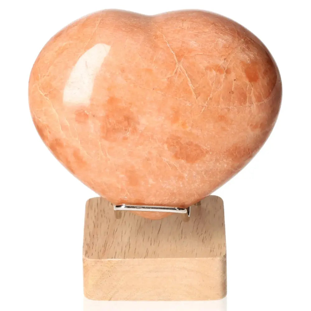 Peach Moonstone Heart for emotional balance, intuition, and restful sleep. Perfect for enhancing sensitivity and attractiveness.