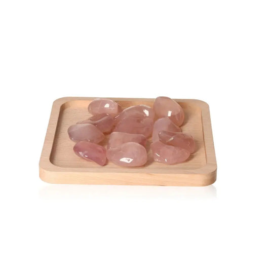 Pink Chalcedony XXL healing crystals on wooden tray, promoting emotional balance and protection from stress and anxiety.