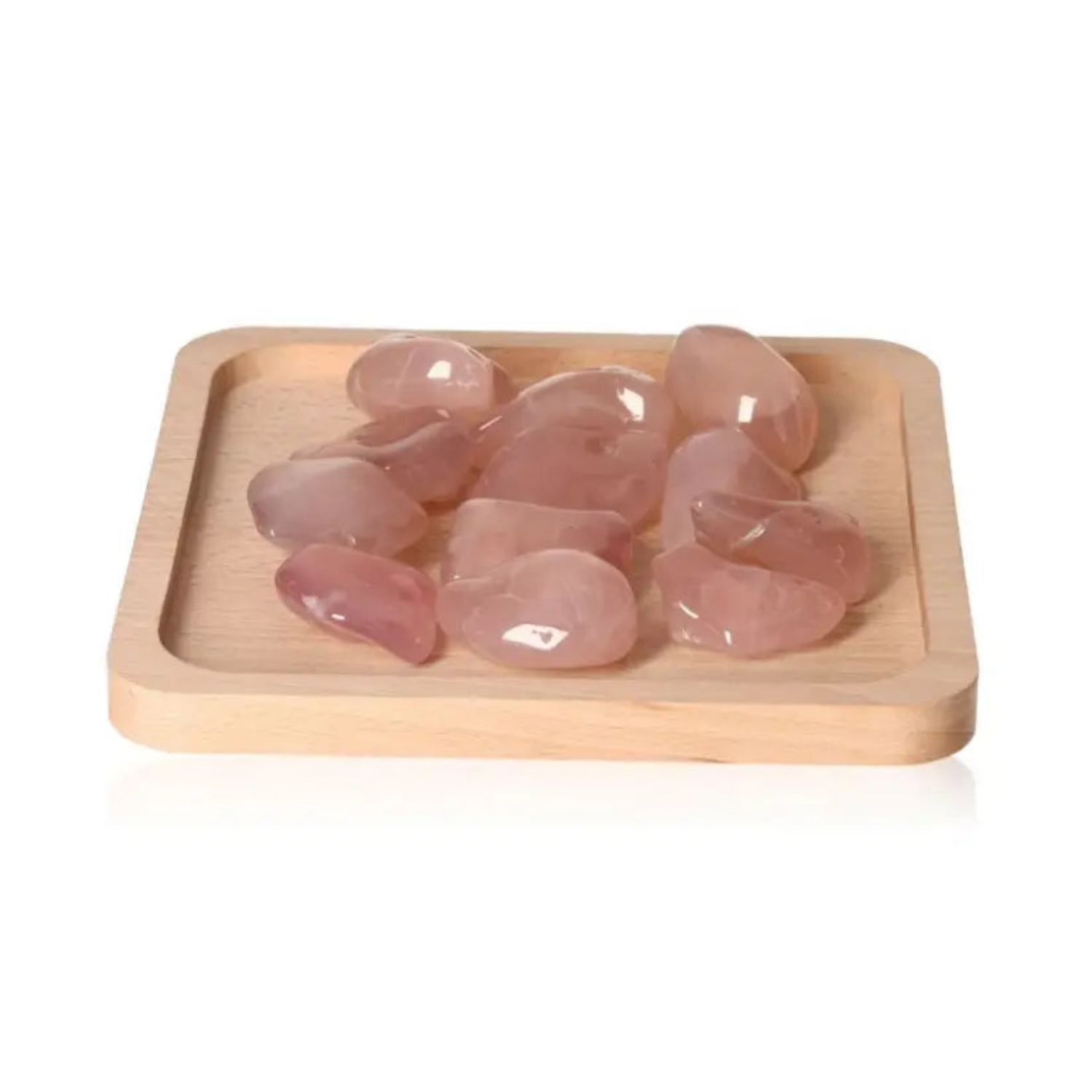 Pink Chalcedony XXL healing crystals on wooden tray, promoting emotional balance and protection from stress and anxiety.
