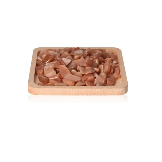Tray of tumbled sunstone crystals for strengthening psyche, boosting energy, and restoring joy. Ideal for relief from melancholy and depression.