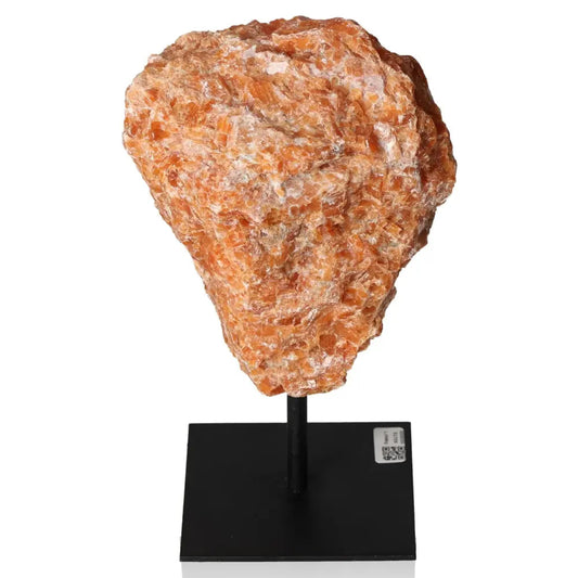 Orchid Calcite gemstone on a metal stand, showcasing vibrant orange and pink hues, symbolizing motivation and creativity.