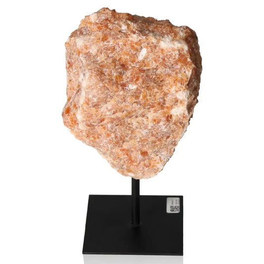Orchid Calcite on metal stand showcasing vibrant orange and pink tones, symbolizing motivation and creativity for personal growth.