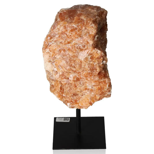 Orchid Calcite on metal stand showcasing vibrant orange and pink tones, symbolizing creativity and emotional strength.