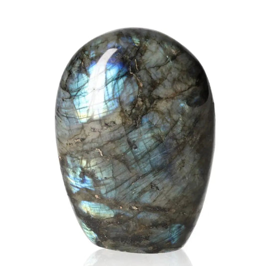 Polished cut base labradorite gemstone with vibrant flashes of color by Sylvia Crystals, showcasing natural beauty and energy.