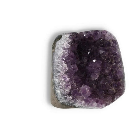 Amethyst Cut Base Geode from Sylvia Crystals' collection, showcasing luxurious purple crystals and enhancing space aesthetics.