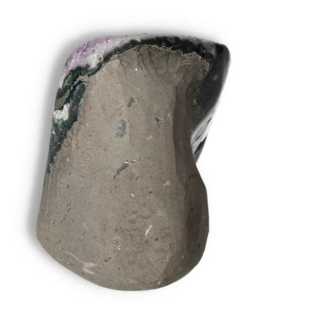 Amethyst Cut Base Geode side view showcasing natural rock texture and violet hue, curated by Sylvia Crystals for luxury and spiritual well-being.