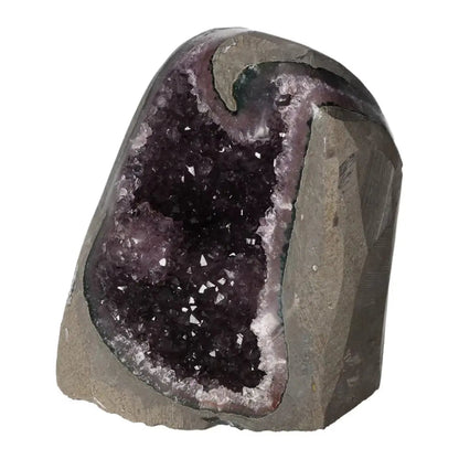 Amethyst Cut Base Geode by Sylvia Crystals, showcasing deep purple hues for natural elegance and conscious living.