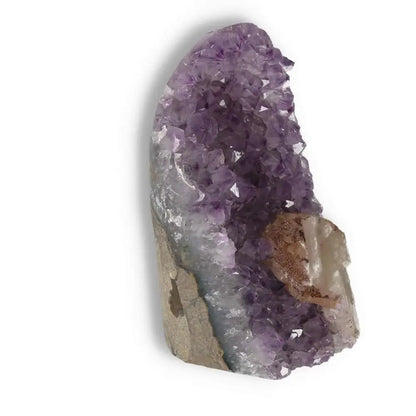 Premium Amethyst Cut Base Geode by Sylvia Crystals, showcasing elegant, stress-reducing purple crystals on a natural stone base.
