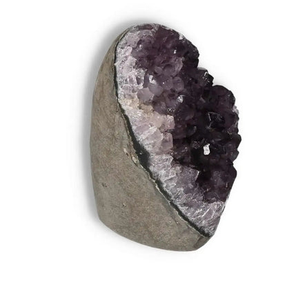 Amethyst Cut Base Geode from Sylvia Crystals, showcasing deep purple crystals ideal for stress reduction and emotional balance.