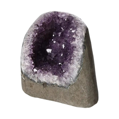 Amethyst Cut Base Geode from Sylvia Crystals with deep purple hues and unique formation, symbolizing peace and spiritual harmony.