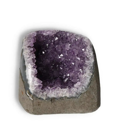 Amethyst Cut Base Geode from Sylvia Crystals featuring deep purple hues, symbolizing peace and spirituality.