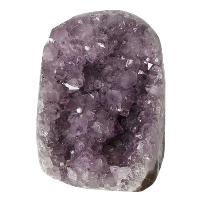 Amethyst Cut Base Geode from Sylvia Crystals, showcasing radiant purple quartz crystals ideal for stress relief and concentration.
