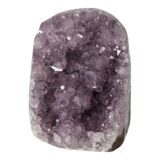 Amethyst Cut Base Geode from Sylvia Crystals, showcasing radiant purple quartz crystals ideal for stress relief and concentration.