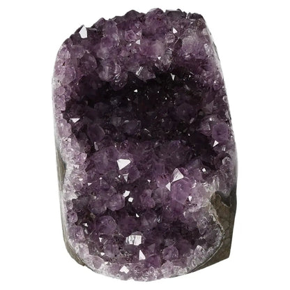 Amethyst Cut Base Geode with deep purple crystals, sourced by Sylvia Crystals, known for enhancing space and providing positive energy.