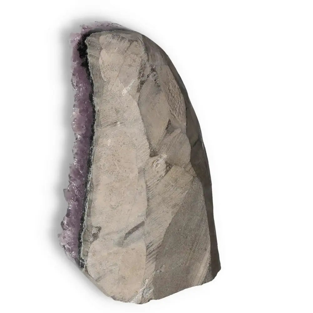 Amethyst cut base geode with rich purple hues, known for stress-reducing properties, sourced from Sylvia Crystals.