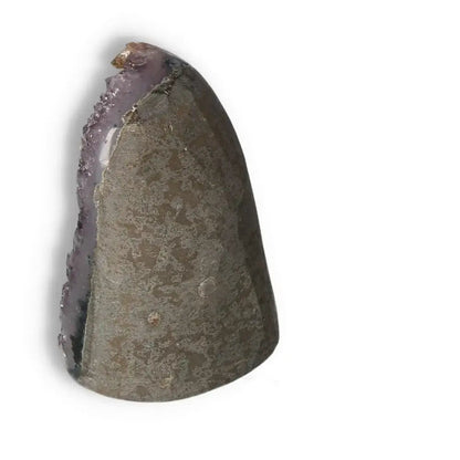 Amethyst cut base geode showcasing its unique structure and mesmerizing hues, a premium selection for spiritual enhancement by Sylvia Crystals.