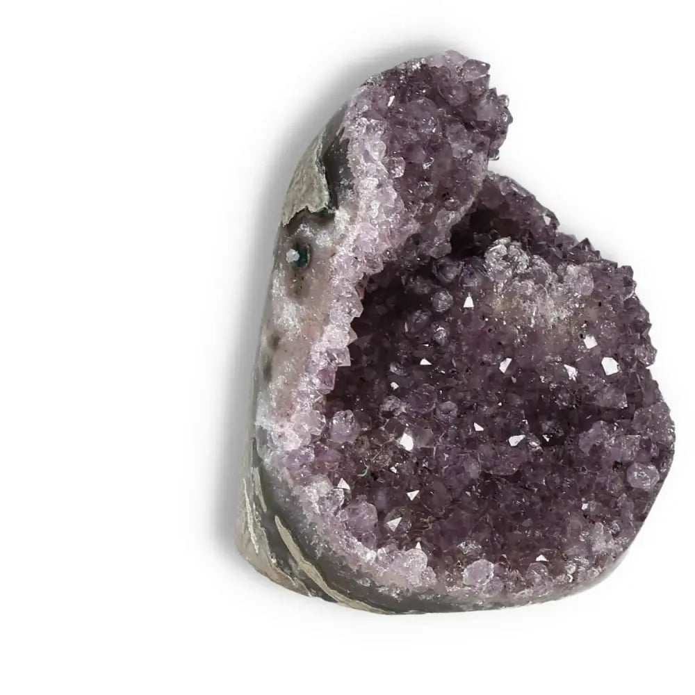 Amethyst cut base geode with deep purple crystals, enhancing well-being and stress relief, from Sylvia Crystals