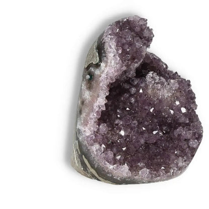 Amethyst cut base geode with deep purple crystals, enhancing well-being and stress relief, from Sylvia Crystals