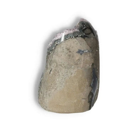Amethyst cut base geode from Sylvia Crystals, known for stress reduction and emotional stability, with natural stone texture.