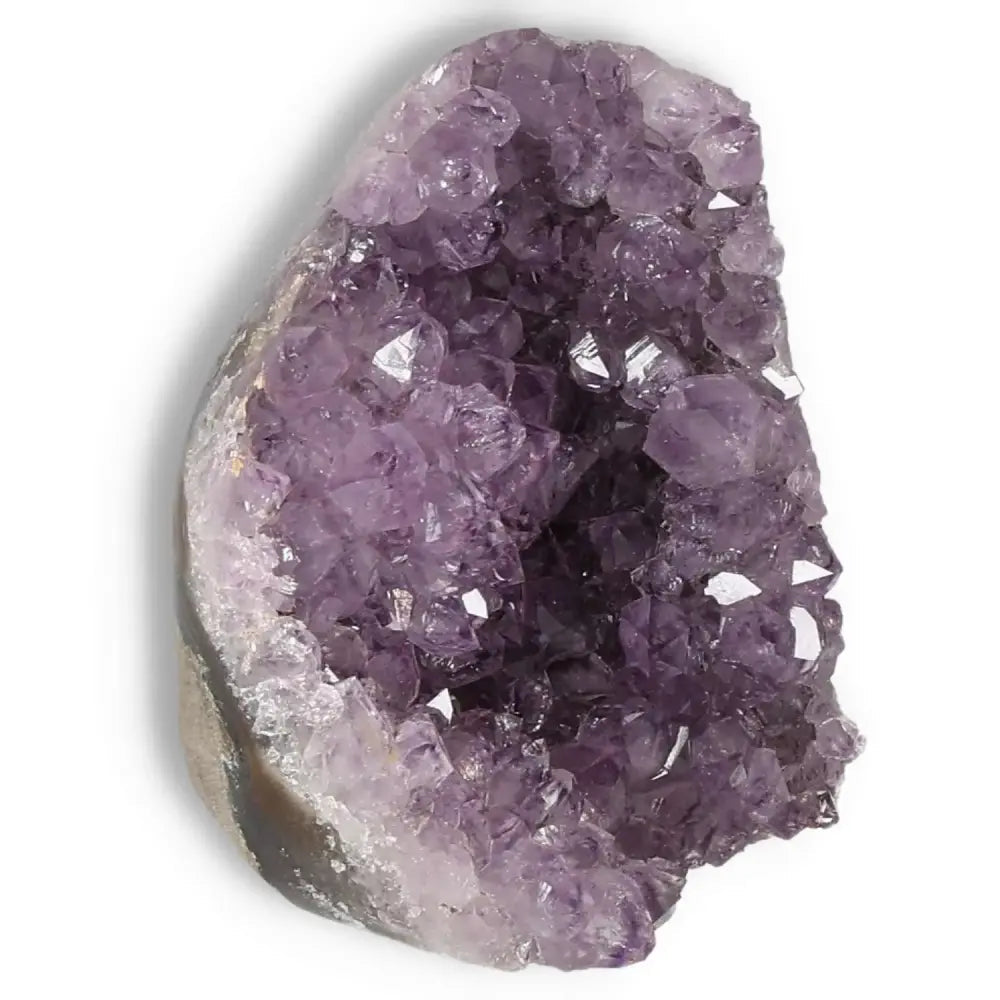Amethyst cut base geode from Sylvia Crystals showcasing luxury and natural beauty, known for its soothing energy and premium quality.