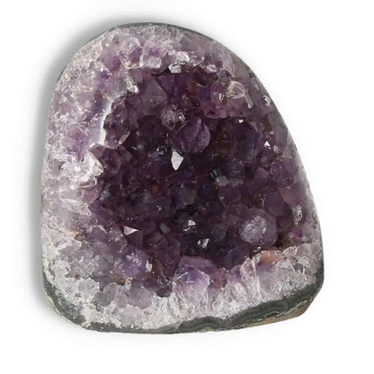 Amethyst cut base geode from Sylvia Crystals with deep purple hues, perfect for enhancing spaces with natural beauty and tranquility.