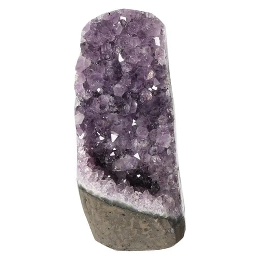 Amethyst cut base geode from Sylvia Crystals, showcasing exquisite purple crystals with stress-reducing and energy-boosting benefits.