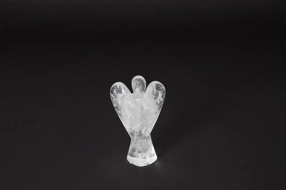 Angel Lemurian Quartz crystal sculpture on black background, stands 10 cm tall; enhances emotional stability, reduces stress, boosts energy.