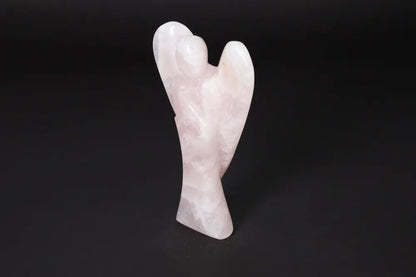 Angel-shaped rose quartz statue, 15 cm, known for its purifying energy and ability to neutralize negative vibrations and radiation.
