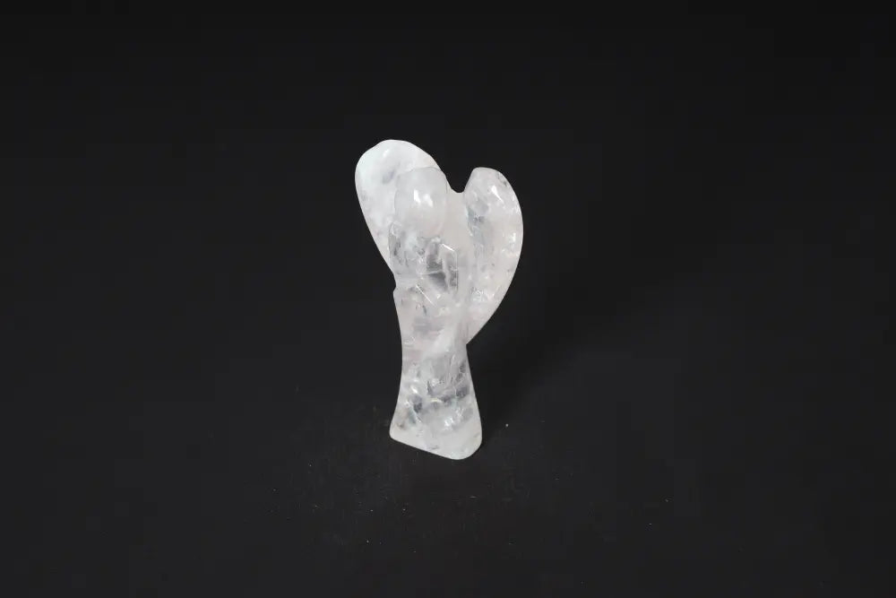 9 cm Angel Rose Quartz figurine on black background, symbolizing unconditional love and emotional healing.