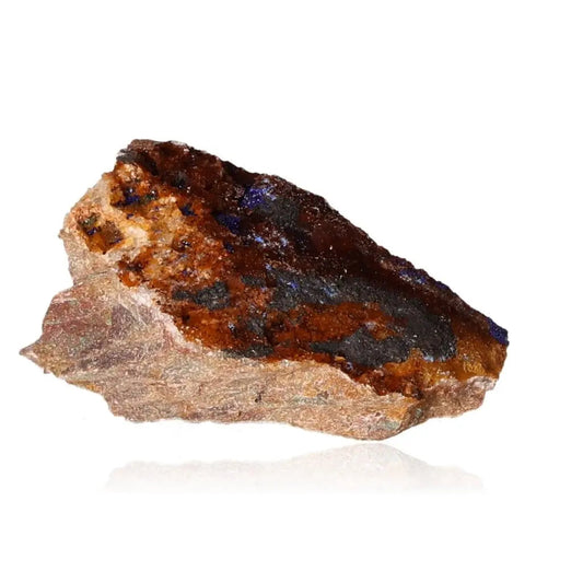 Azurite mineral with deep blue hues and copper patterns, known for enhancing mental clarity and self-awareness, ideal for collectors.