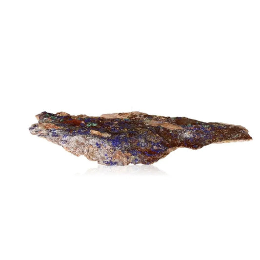 Azurite mineral specimen displaying deep blue hues and unique patterns, ideal for mental clarity and spiritual growth on white background