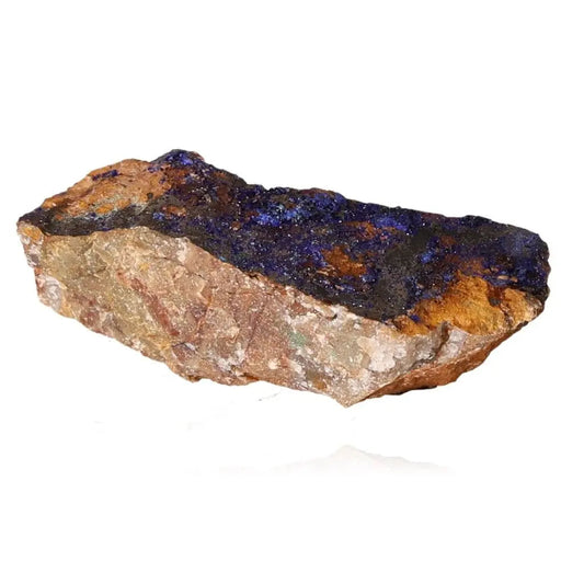 Azurite stone with deep blue hues and unique patterns, known for boosting mental clarity and aiding personal growth.