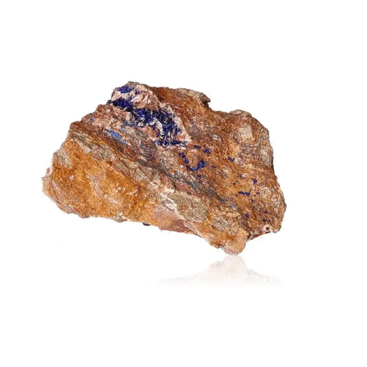 Azurite mineral rock displaying deep blue hues and unique patterns, ideal for mental clarity and personal growth on a spiritual journey.