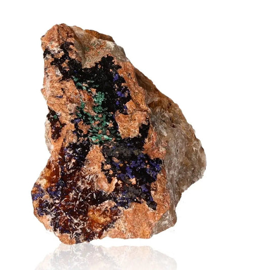 Azurite mineral specimen with deep blue hues and unique patterns, known for boosting mental clarity and aiding personal growth.
