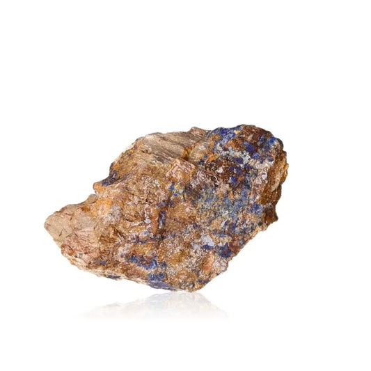 Raw Azurite stone displaying deep blue hues, known for enhancing mental clarity and aiding personal growth on a spiritual journey.
