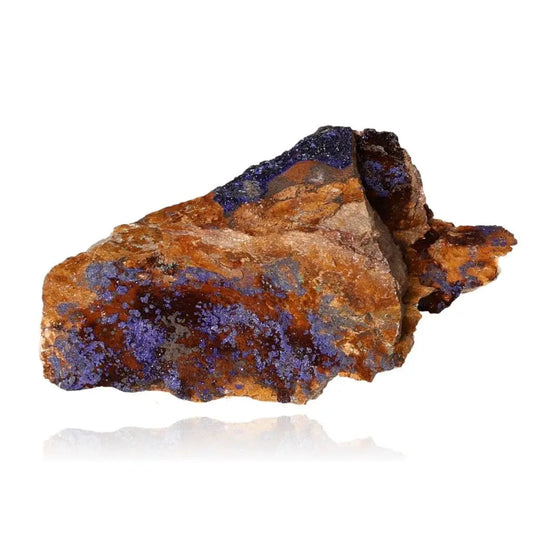 Azurite mineral rock with deep blue hues and unique patterns, known for enhancing mental clarity and self-awareness; ideal for collectors.
