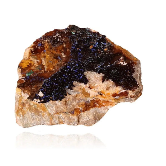 Azurite mineral featuring deep blue hues and unique patterns, known for enhancing mental clarity and personal growth.