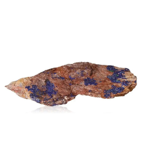 Azurite mineral with deep blue hues and unique patterns, known for boosting mental clarity and self-awareness; ideal for collectors.