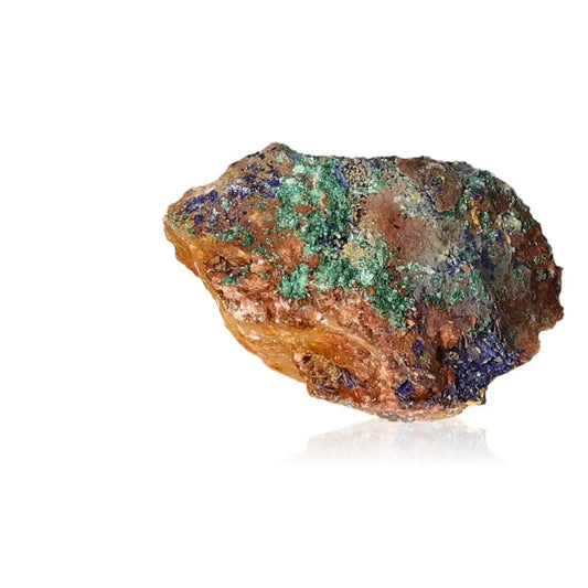 Azurite druzy stone with vibrant blue and green hues, known for enhancing intuition and spiritual insight, on a white background.