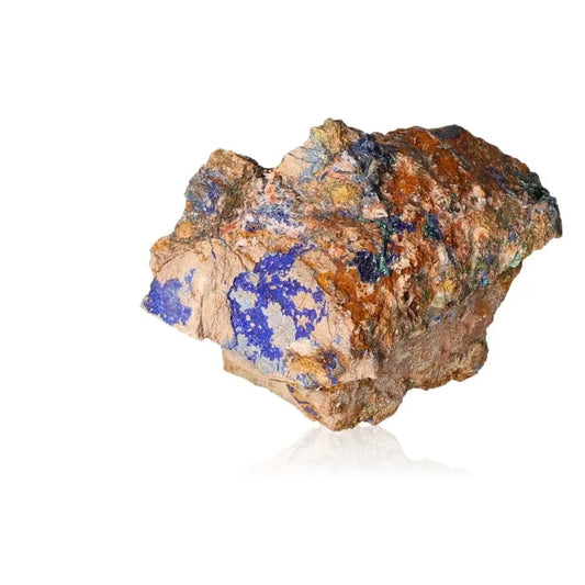 Azurite druzy with deep blue hues, known for enhancing spiritual intuition and metaphysical properties, isolated on white background.