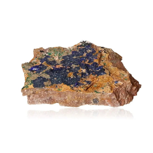 Azurite with Malachite mineral showcasing deep blue and green hues on a rough rock base, highlighting its captivating beauty and essence.