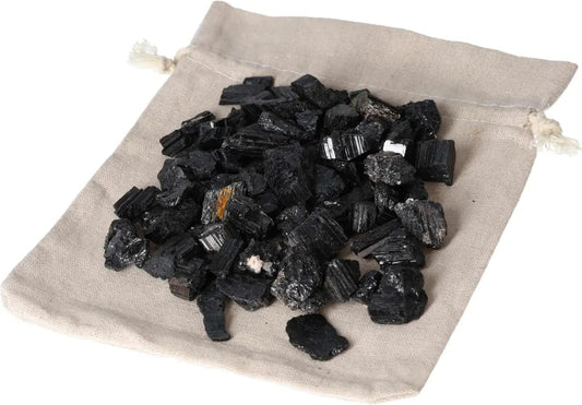 Black Tourmaline Chips 1 KG on fabric bag, ideal for spiritual balance and mental clarity by Sylvia Crystals.