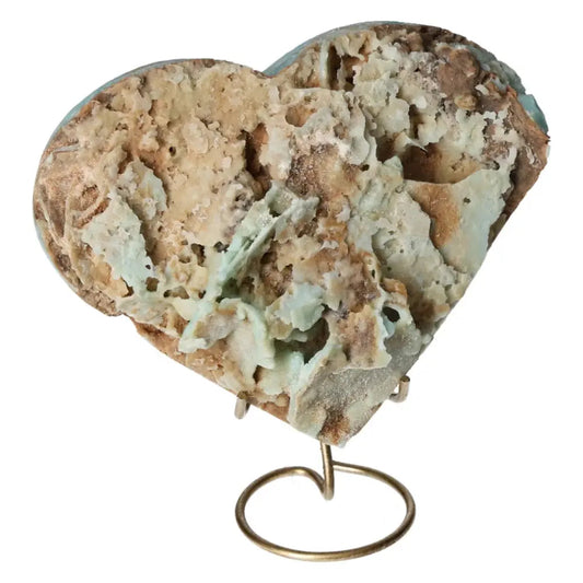Heart-shaped Blue Aragonite crystal on stand, showcasing its soothing blue hues and textured surface for emotional balance and calm.