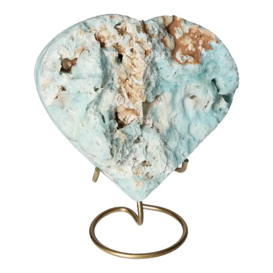 Blue Aragonite Heart Crystal with soothing hues on display stand, symbolizing emotional balance and clear communication.