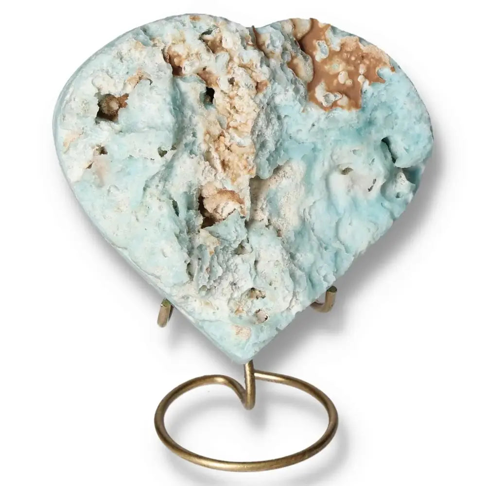 Heart-shaped Blue Aragonite crystal on stand, showcasing calming blue hues, ideal for emotional balance and communication.