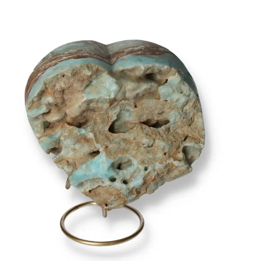 Blue Aragonite Heart, a calming crystal for emotional balance on a stand, showcasing its natural, vibrant blue hues and texture.