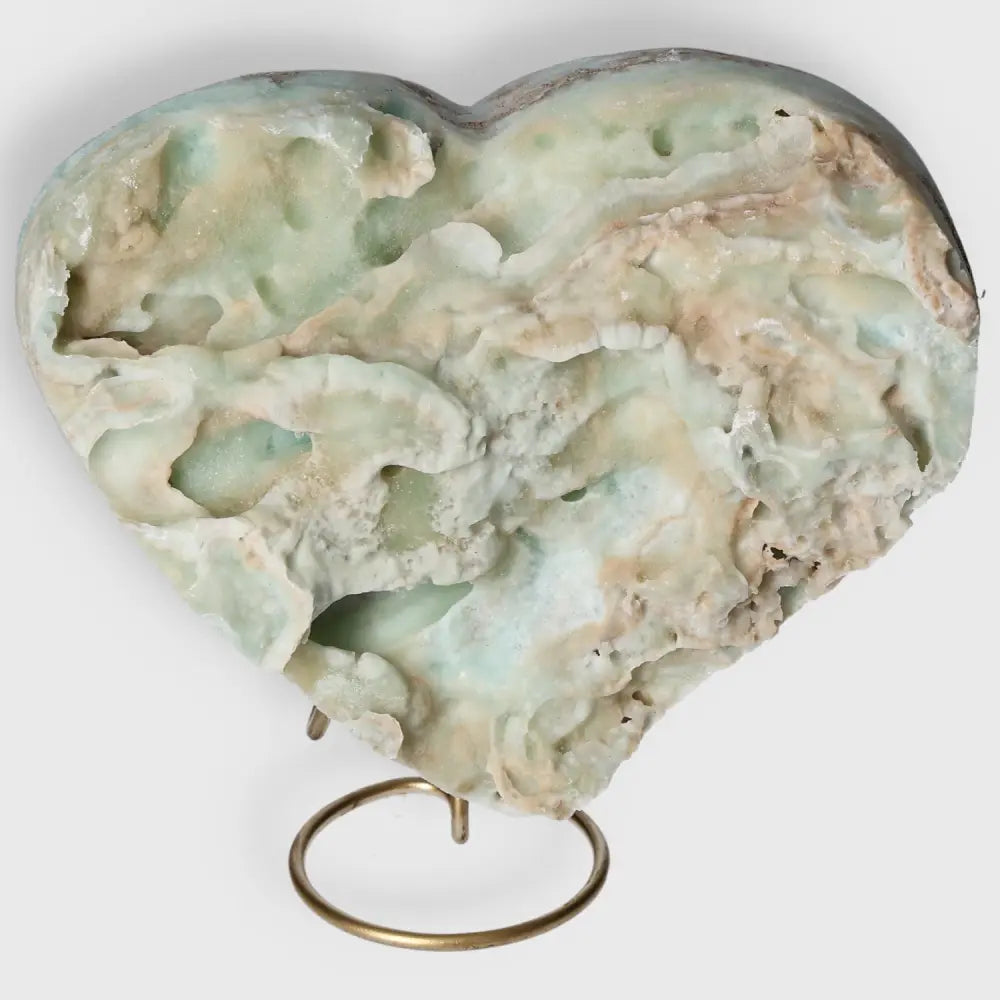 Heart-shaped Blue Aragonite gemstone with serene ocean-blue hues, for emotional healing and spiritual connection.