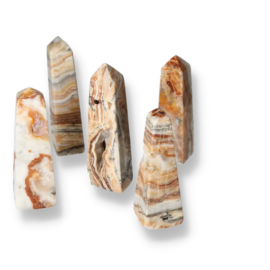 Five Brown Aragonite Towers showcasing rich earthy tones and natural patterns, ideal for enhancing space with grounding energy.